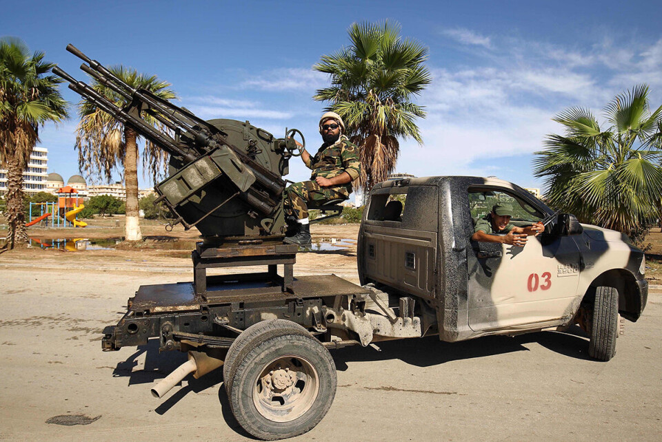 Styrker tilknyttet den 'sterke mannen i øst' Khalifa Haftar på vakt i Benghazi. Foto: NTB scanpix
