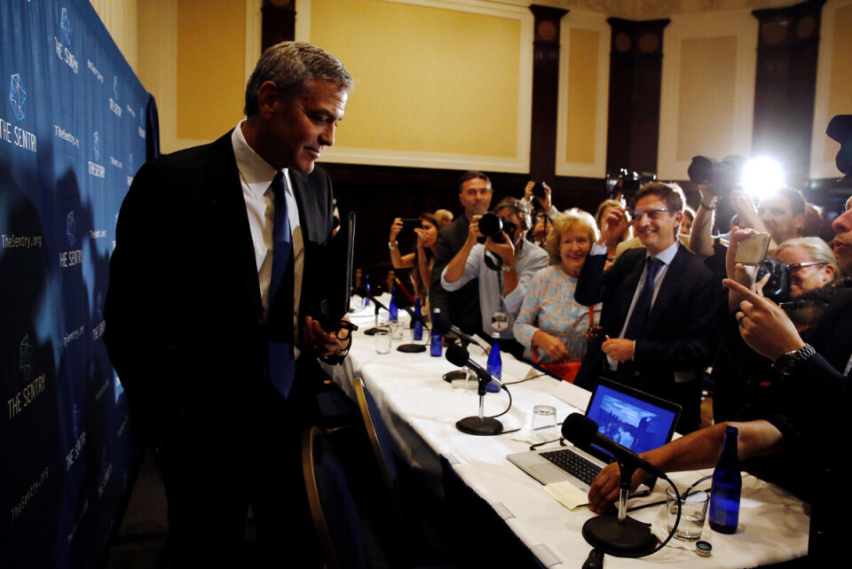 George Clooney var i panelet som la fram en rapport om maktmisbruk i Sør-Sudan. Foto: Reuters / NTB scanpix