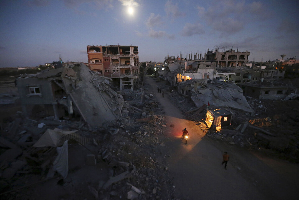 Gazakrigen sommeren 2014 var, ifølge IDF, et svar på rakettangrep fra militante islamister og et ledd i Israels kamp mot Hamas. Krigen varte i nærmere én måned - frem til det ble inngått en våpenhvile 5. august. Da var minst 2000 palestinere og 67 israelere drept. Rundt 10 000 var såret, og store deler av Gaza by lå i ruiner. Foto: Mohammed Salem / Reuters / NTB scanpix