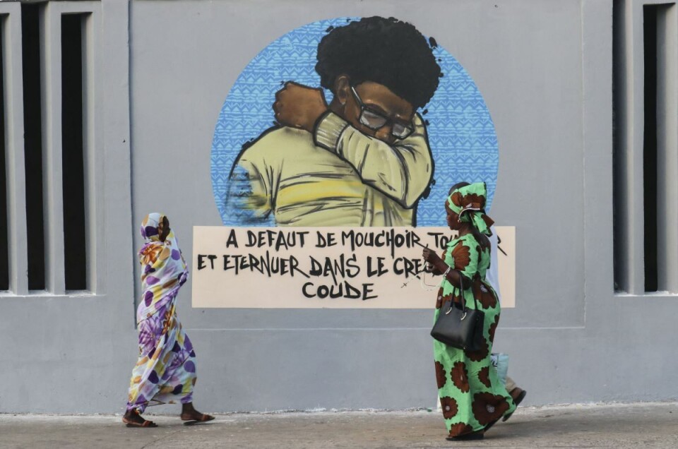Over hele kontinentet iverksetter myndighetene tiltak og lanserer holdningskampanjer. I Senegal bidrar kjente gatekunstnere med å spre budskap om god hygiene. Foto: Abaca / NTB scanpix