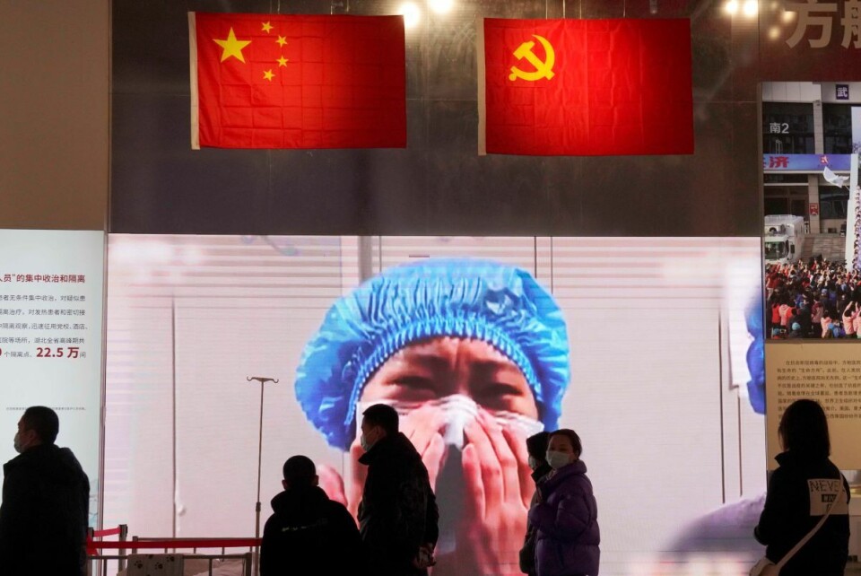En utstilling om Kinas håndtering av koronapandemien i byen der den begynte, Wuhan. Foto: Ng Han Guan / AP / NTB