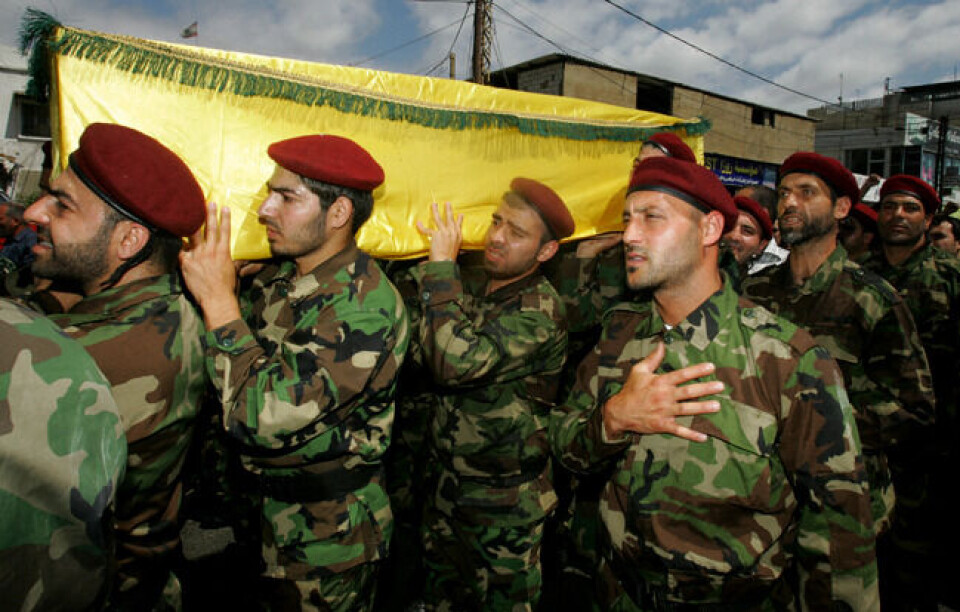 Hezbollah er allerede tungt involvert i stridighetene, og mye tyder på at deres engasjement bare vil bli større. Krigere som kommer hjem i kister blir hedret som martyrer. Foto: Scanpix/ Reuters