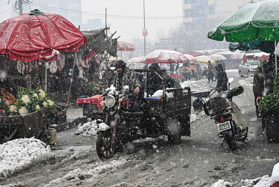 Snøen lavet ned over en hardt prøvet befolkning i Kabuls hovedstad denne uka. Foto: Mohd Rasfhan / AFP / NTB