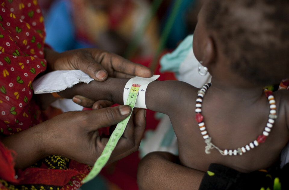 A child has the circumference of her arm measured to check her growth, at a walk-in feeding center in Mao, capital of the Kanem region of Chad, Tuesday, April 17, 2012. UNICEF estimates that 127,000 children under 5 in Chad's Sahel belt will require lifesaving treatment for severe acute malnutrition this year, with an estimated 1 million expected throughout the wider Sahel region of West and Central Africa in the countries of Niger, Nigeria, Mali, Chad, Burkina Faso, Cameroon, Senegal and Mauritania. The organization says the current food and nutrition crisis stems from scarce rainfalls in 2011, which caused poor harvests and livestock production, though the situation in Chad has also been exacerbated by an influx of Chadians returning from Libya as a result of the conflict there. (AP Photo/Ben Curtis)