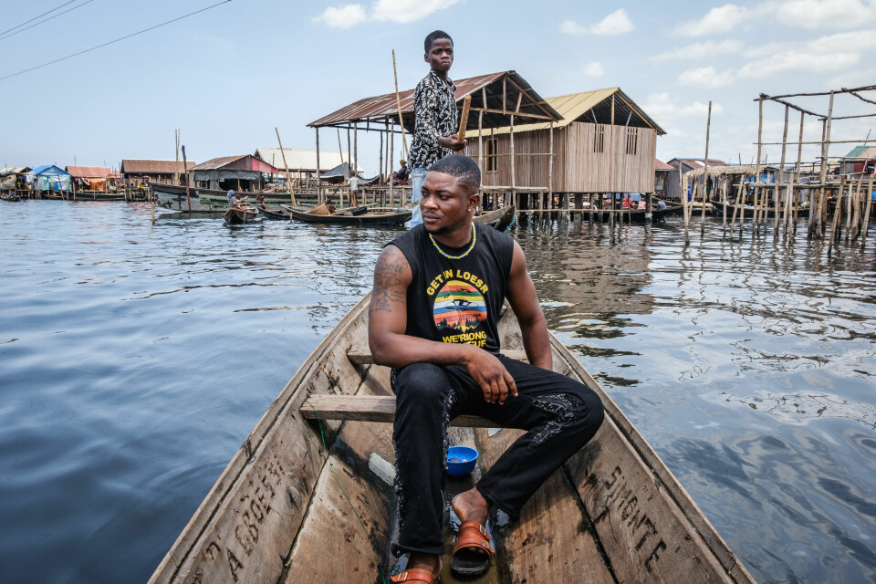 LAGOS, NGA - April 20, 2023: Portriat of Abayomi as he navigates his community; Makoko, Lagos, Nigeria. CREDIT: Taiwo Aina