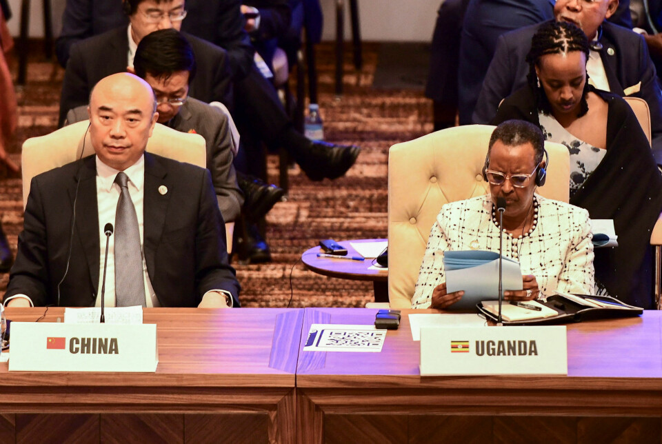Kinas visestatsminister Liu Guozhong ved siden av Uganda's førstedame Janet Museveni under åpningen av the Third South Summit (G77+China) i Kampala, Uganda 21. januar.