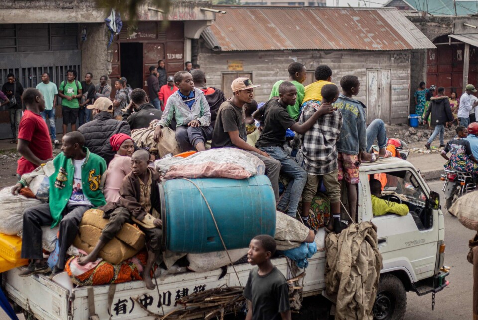 Folk flyktet med eiendelene sine fra Kibati mot Goma i Den demokratiske republikken Kongo 26. januar. Kort tid etter tok M23 kontroll over Goma.