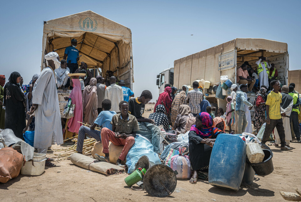 USA har sendt åtte migranter til Sør-Sudan, et land USA advarer sine borgere mot å reise til på grunn av økt konflikt. Bildet viser sørsudanesiske flyktninger som venter på transport fra byen Chadian i øst til Iridimi.